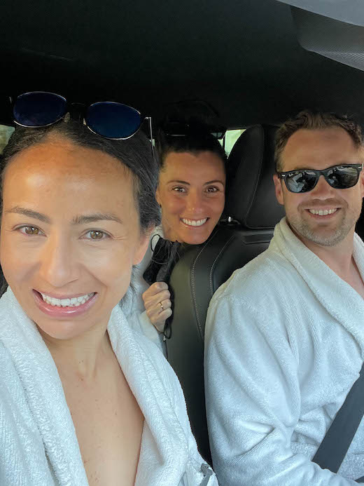 wearing white robes to the hot springs in Tuscany