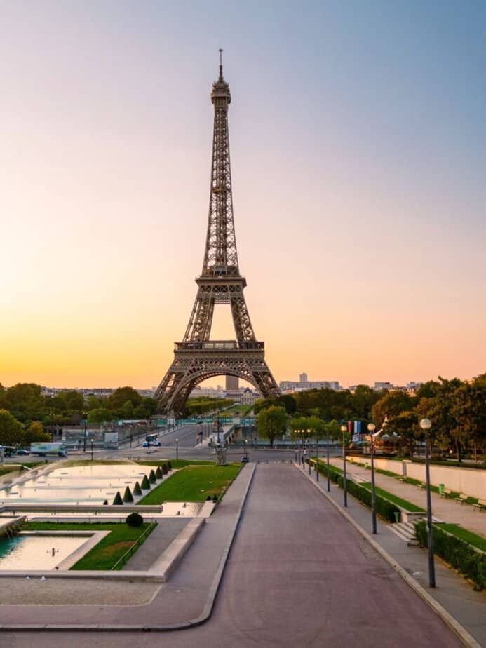 the iconic eiffel tower at sunrise in front of the trocadero square. The perfect thing to add to your paris bucket list